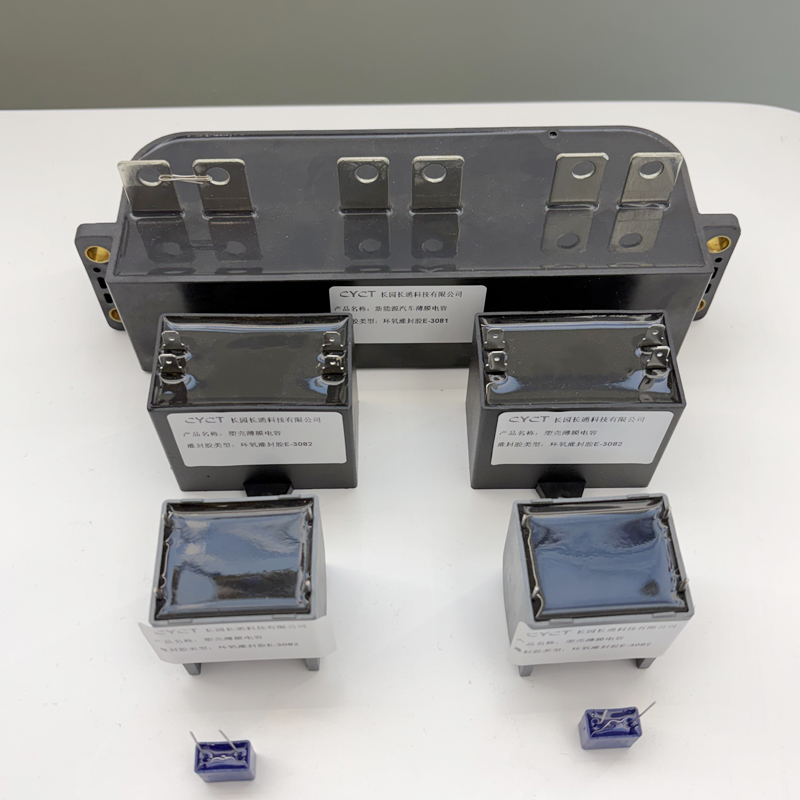 Compuestos de encapsulado para condensadores de pel&iacute;cula